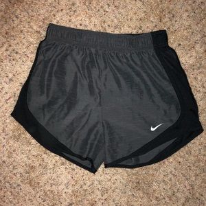 Black and grey Nike shorts.